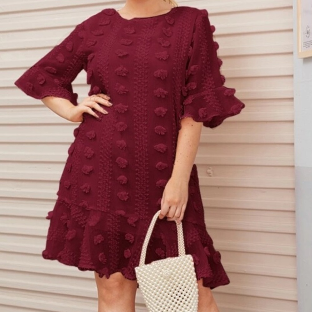 PLUS SWISS DOT DETAIL RUFFLE HEM DRESS IN MERLOT